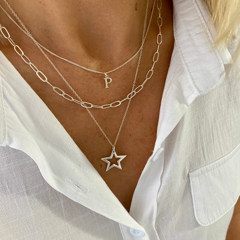 Set of three layering necklaces with initial charm, plain silver chain and silver star charm necklace by KookyTwo