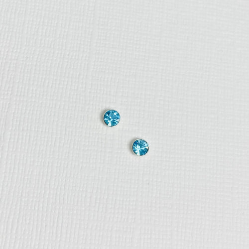 Aquamarine stud earrings. Round blue stud earrings. 