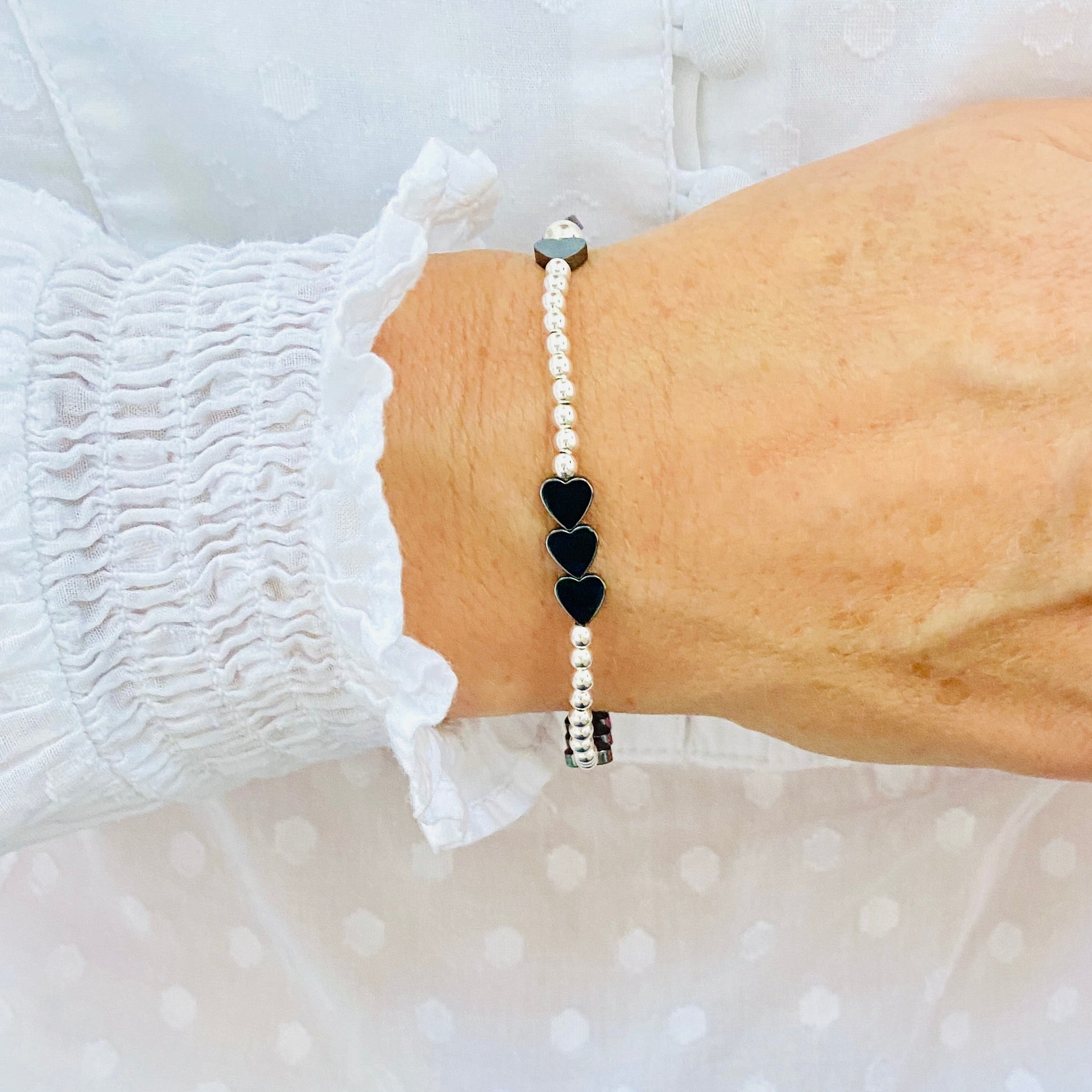 Black heart bead bracelet. Heart bead and silver bead bracelet. Sterling silver heart bracelet.