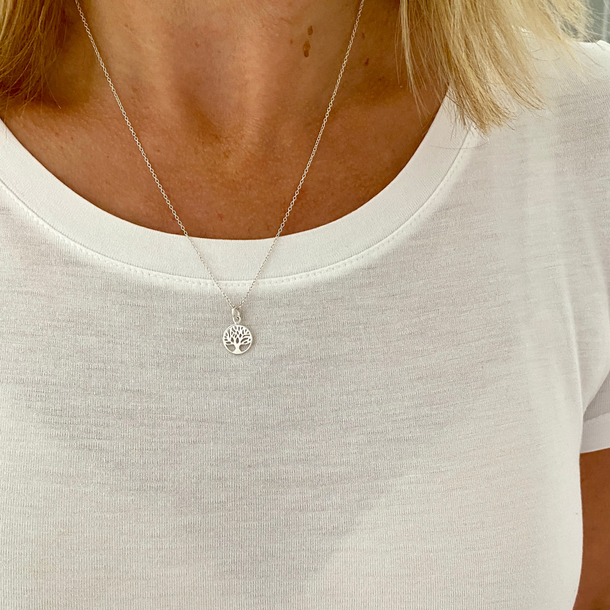 Silver necklace with family tree charm in sterling silver. KookyTwo.