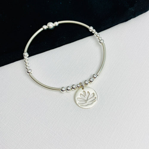 Hand beaded ladies bracelet for yoga fan.Sterling silver bead bracelet with silver lotus flower charm. 