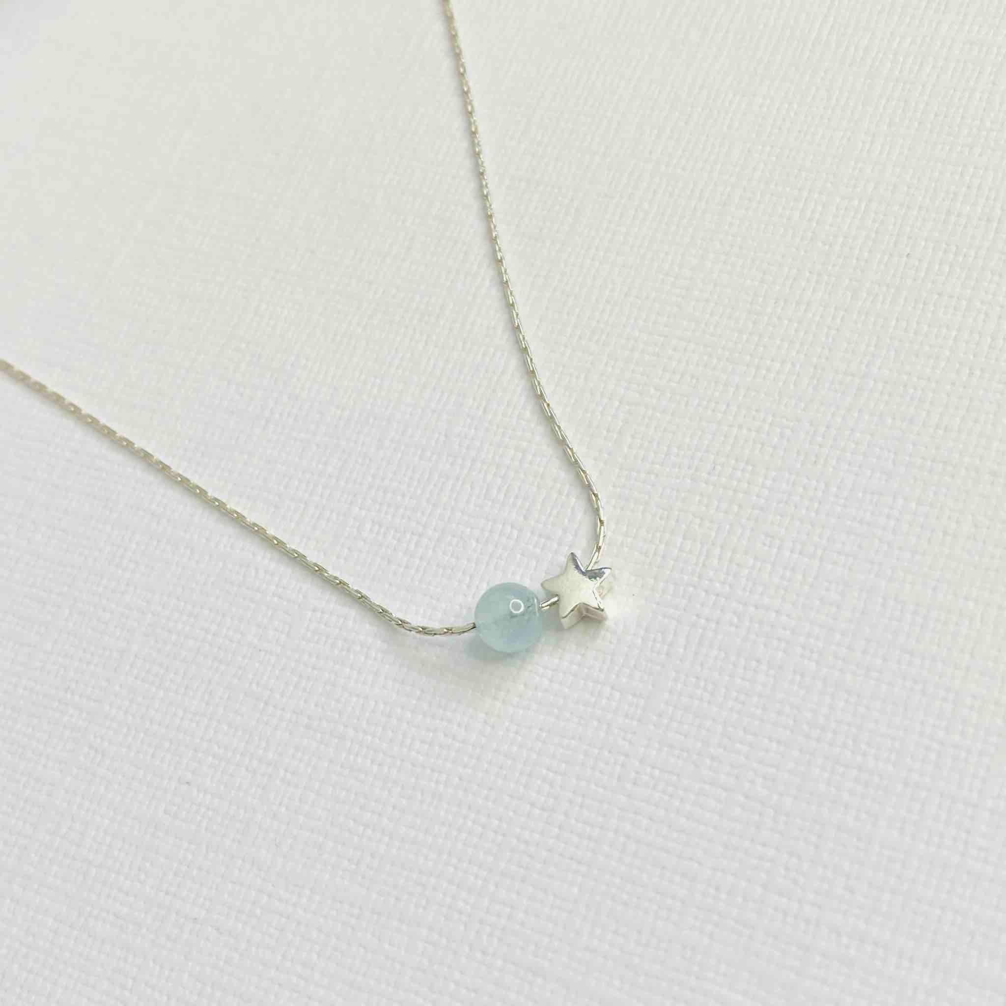 Silver necklace with aquamarine gemstone bead and star bead. Handmade necklace in sterling silver with beads. KookyTwo.