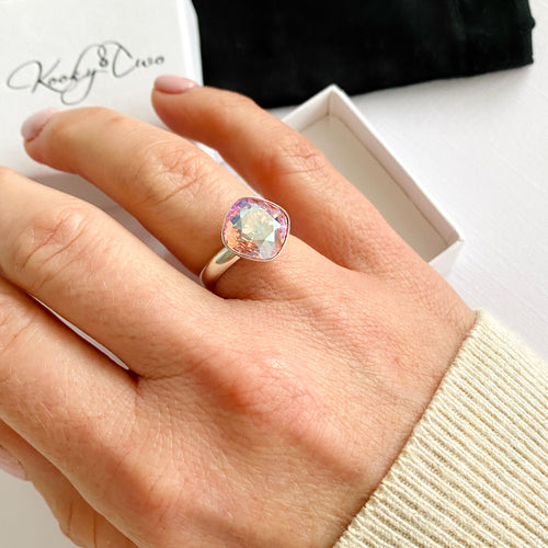 Ladies rose pink crystal ring with sparkly pink Swarovski crystal set in sterling silver ring. 