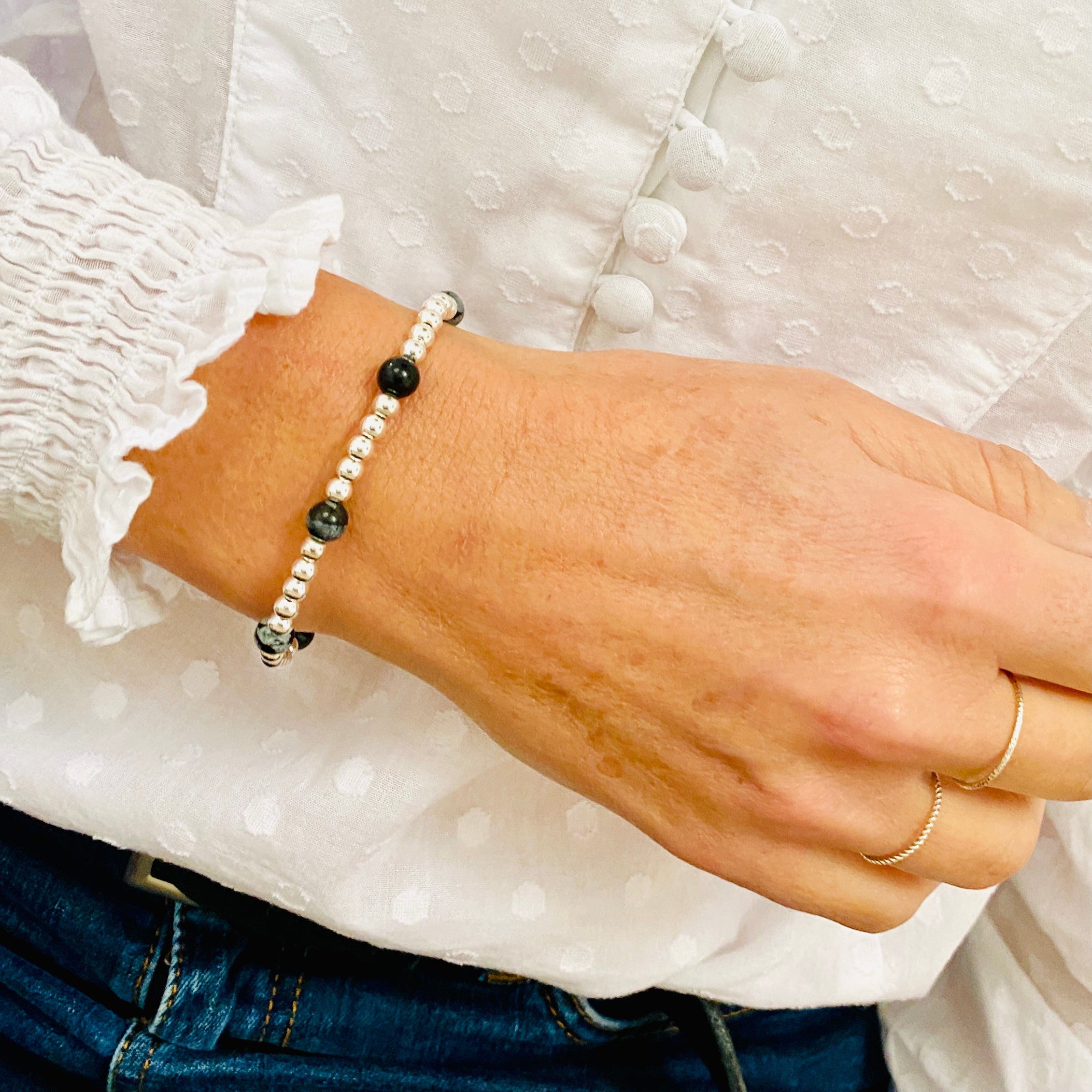 Sterling silver bead bracelet with snowflake obsidian beads. Gemstone jewellery.