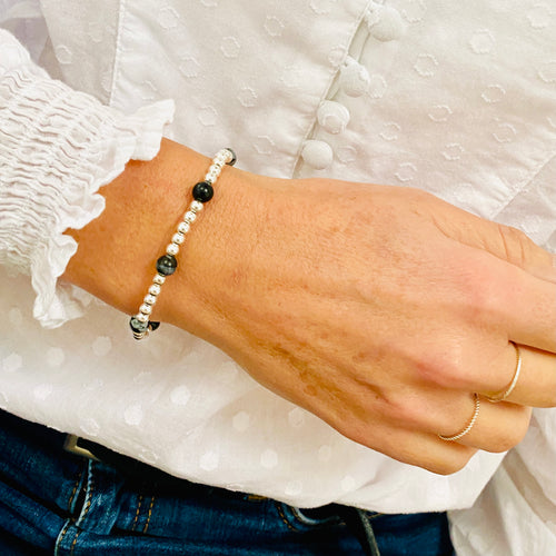 Sterling silver bead bracelet with snowflake obsidian beads. Gemstone jewellery.