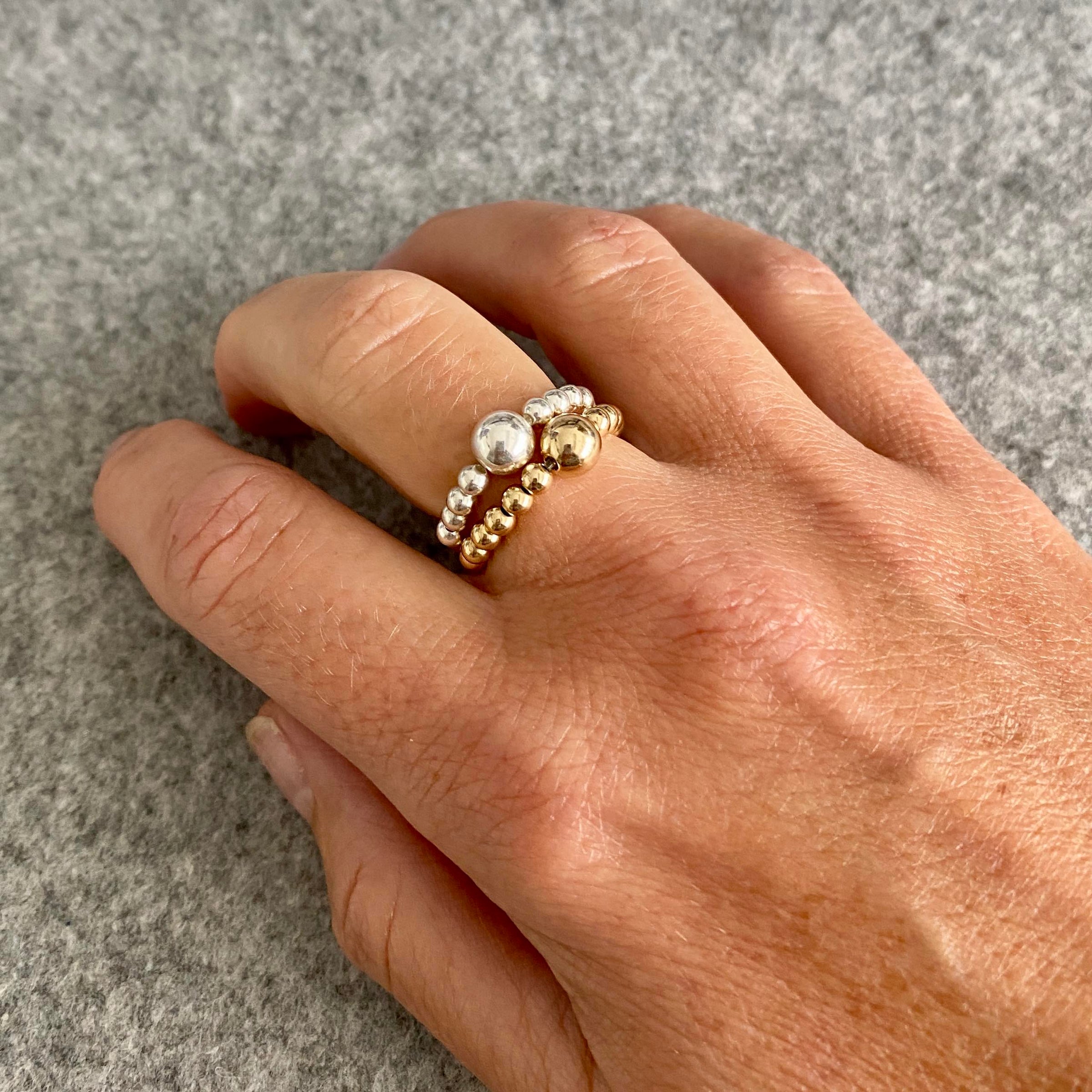 Ring stacking set with silver and gold ring. Beaded rings to be worn together or worn alone.
