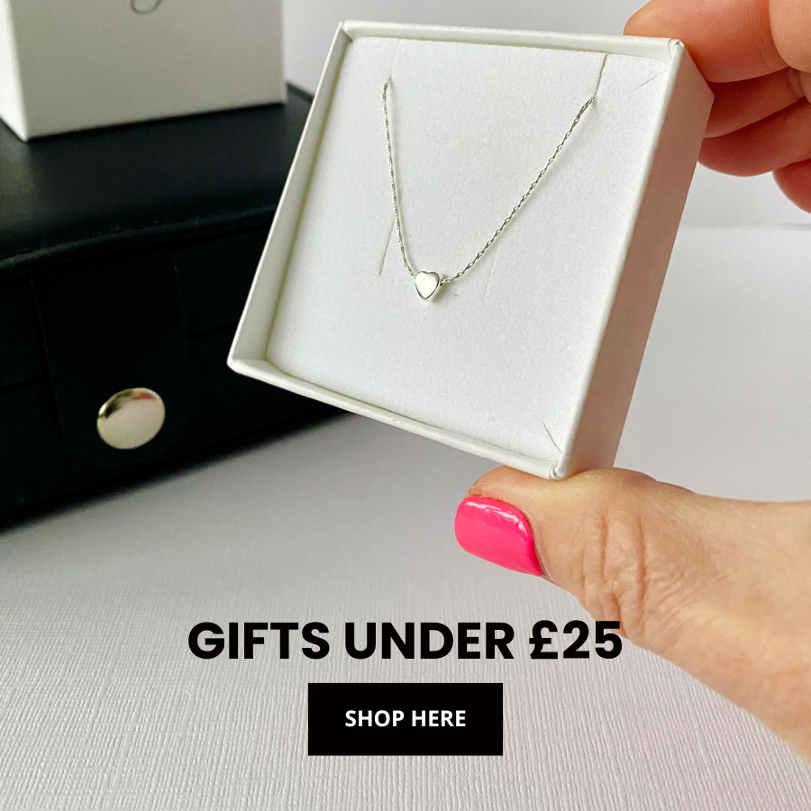 Silver black onyx ring in box with gifts under £25.