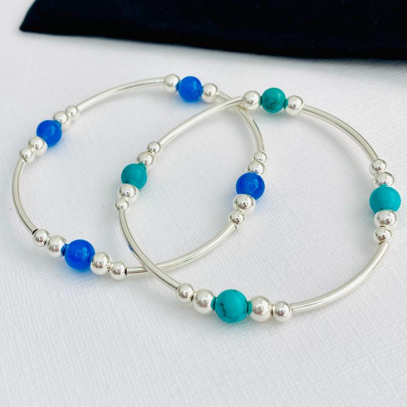 Summer jewellery accessories with bright beads in blue and turquoise.