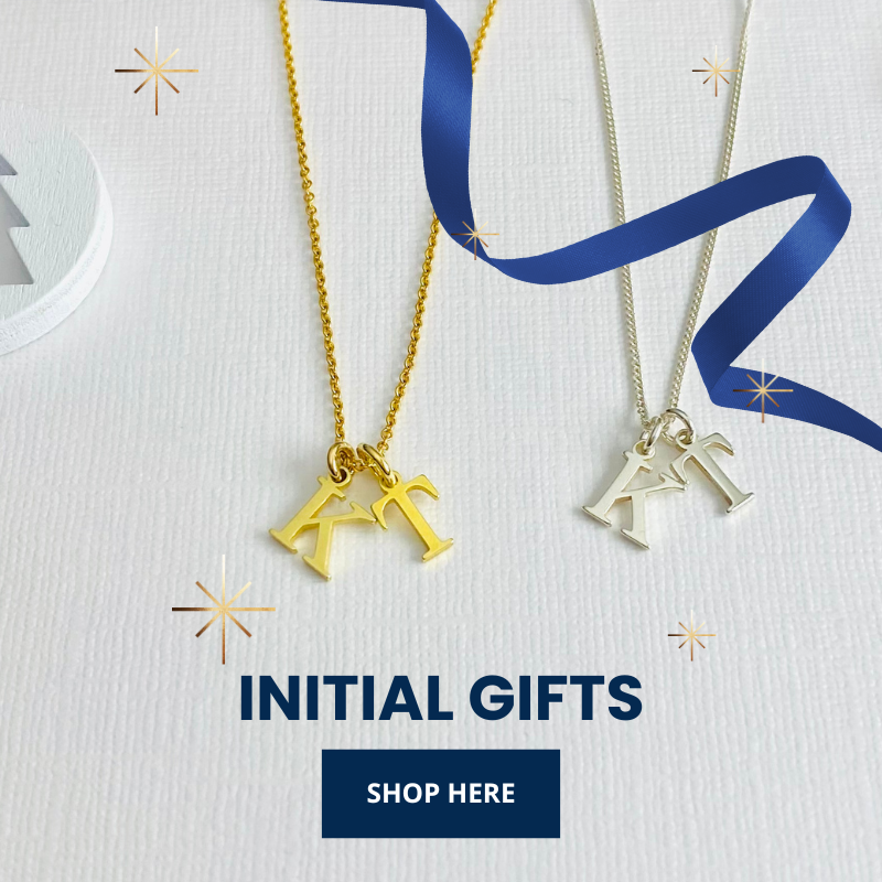 Gold two initial necklace and silver two initial charm necklace on white background with promotional text initial gifts.