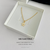 14k gold filled necklace with star pendant in a white box, with words lead and nickel free, making it great for sensitve skin.