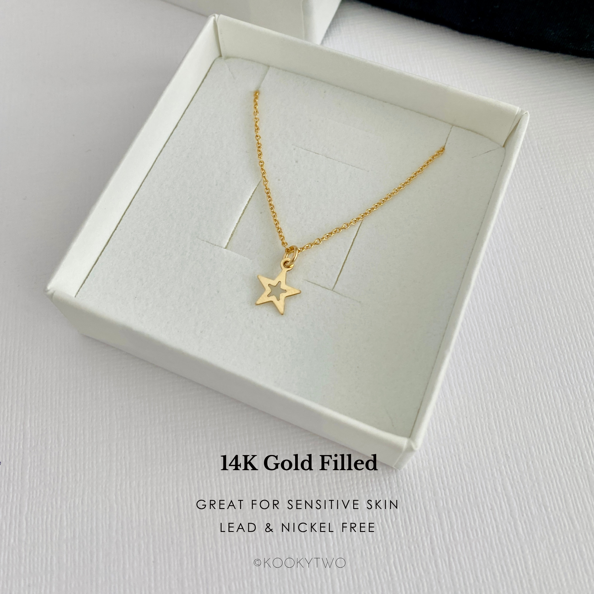 14k gold filled necklace with star pendant in a white box, with words lead and nickel free, making it great for sensitve skin.