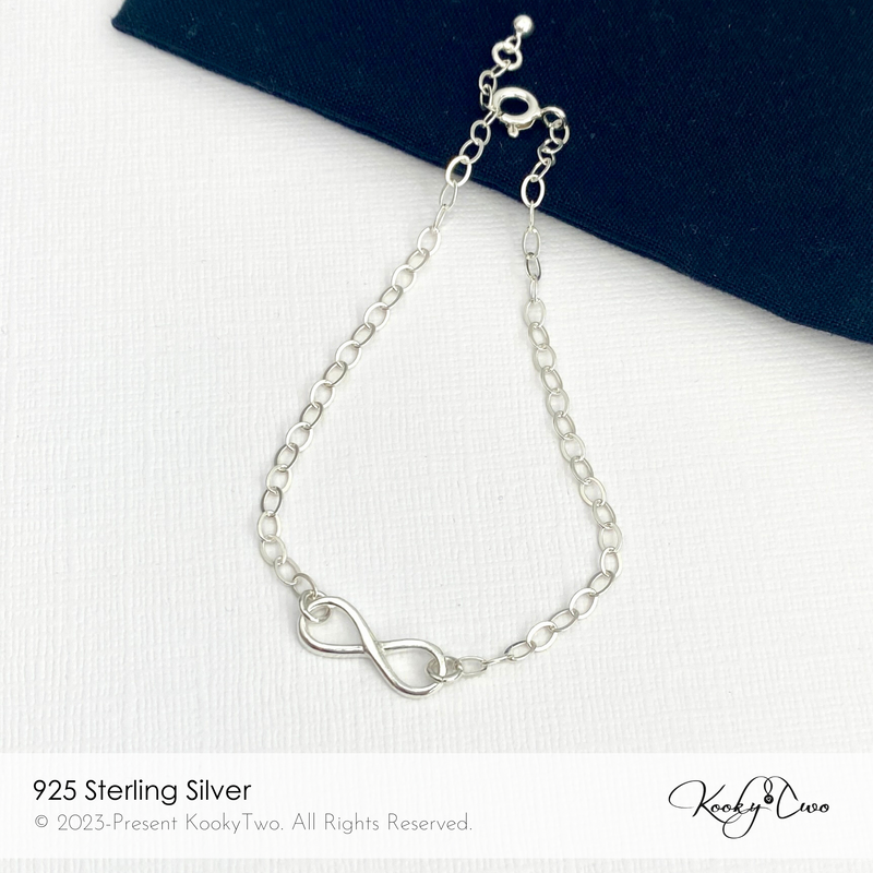 Sterling silver chain bracelet with infinity charm. Bracelet can be adjusted to get the perfect fit. KookyTwo.