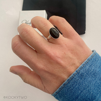 Gemstone ring with black onyx stone in adjustable sterling silver ring setting. KookyTwo.