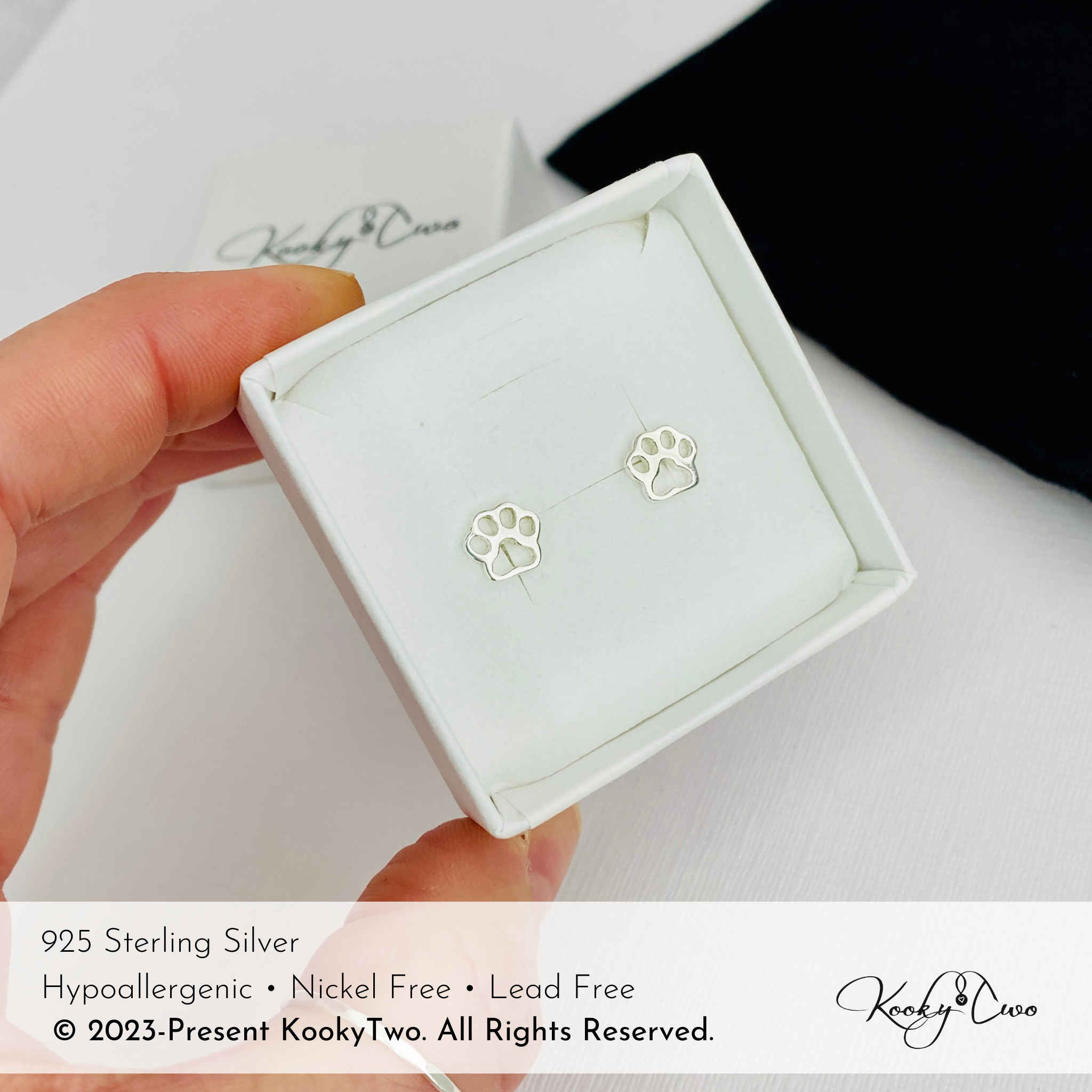 Sterling silver paw print 2025 stud earrings