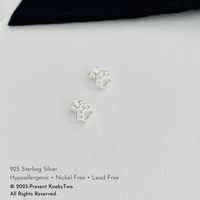 Paw stud earrings in sterling silver. KookyTwo.