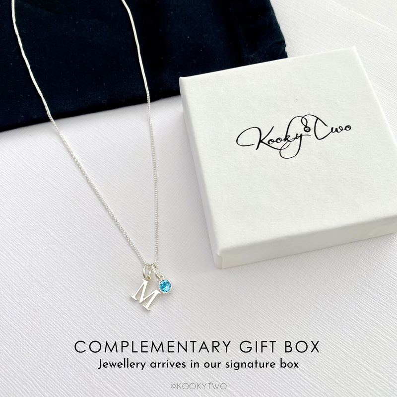 Perfect march birthday gift for her, this dainty sterling silver necklace with initial and aquamarine birthstone is ready to be gifted, to be worn daily and perfect for everyday styling. KookyTwo.