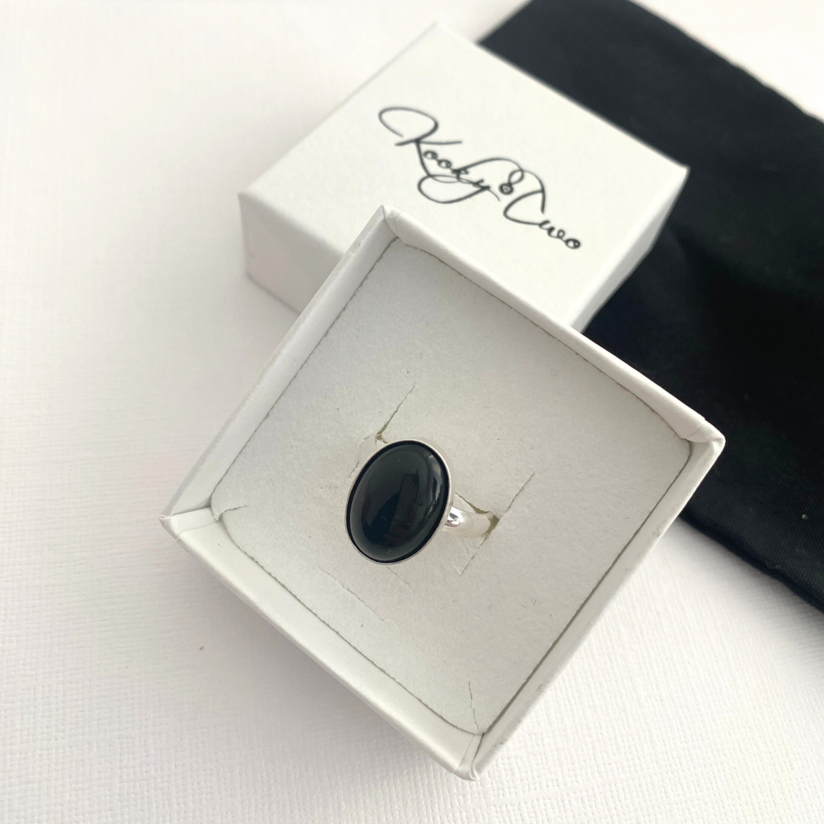 Black onyx adjustable ring in sterling silver. KookyTwo.