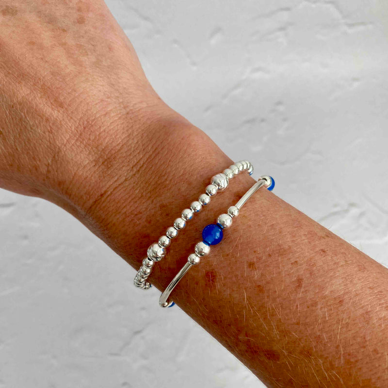 Blue onyx gemstone bracelets with silver beads. KookyTwo bracelets.
