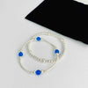 Sterling silver bracelet stacking set with blue beads. Jewellery to add that something blue for a bride on wedding day. KookyTwo wedding jewellery.