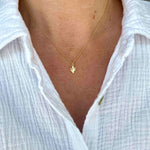 Summer jewellery styling with pretty gold cactus char necklace. KookyTwo.