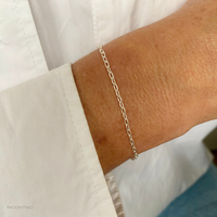 A delicate sterling silver chain bracelet in a minimalist, elegant style, perfect for everyday wear. KookyTwo.