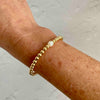 14k gold filled bead bracelet with single freshwater pearl. KookyTwo.