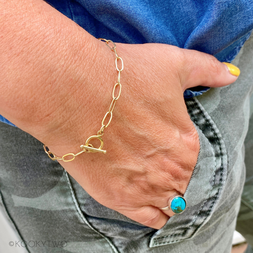 Gold chain bracelet with t bar fastening. KookyTwo.