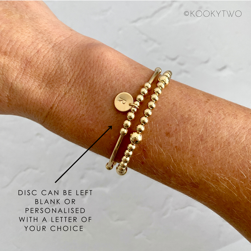 CORAL | Gold Disc Bracelet Stack