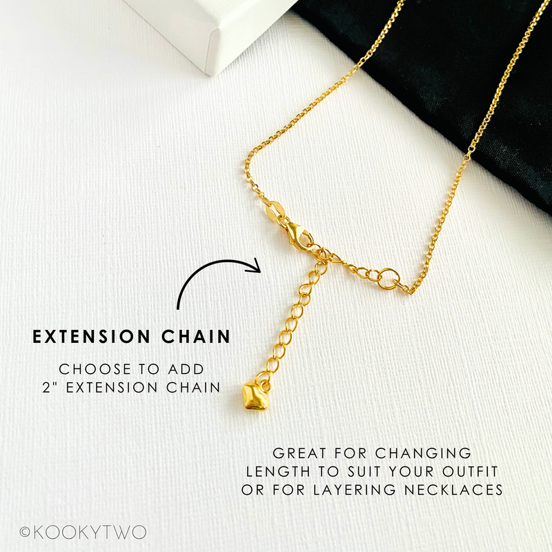 Gold extension chain for necklaces on a white background with text and Kookytwo branding.