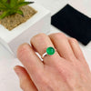 Green stone ring with adjustable silver band. KookyTwo.