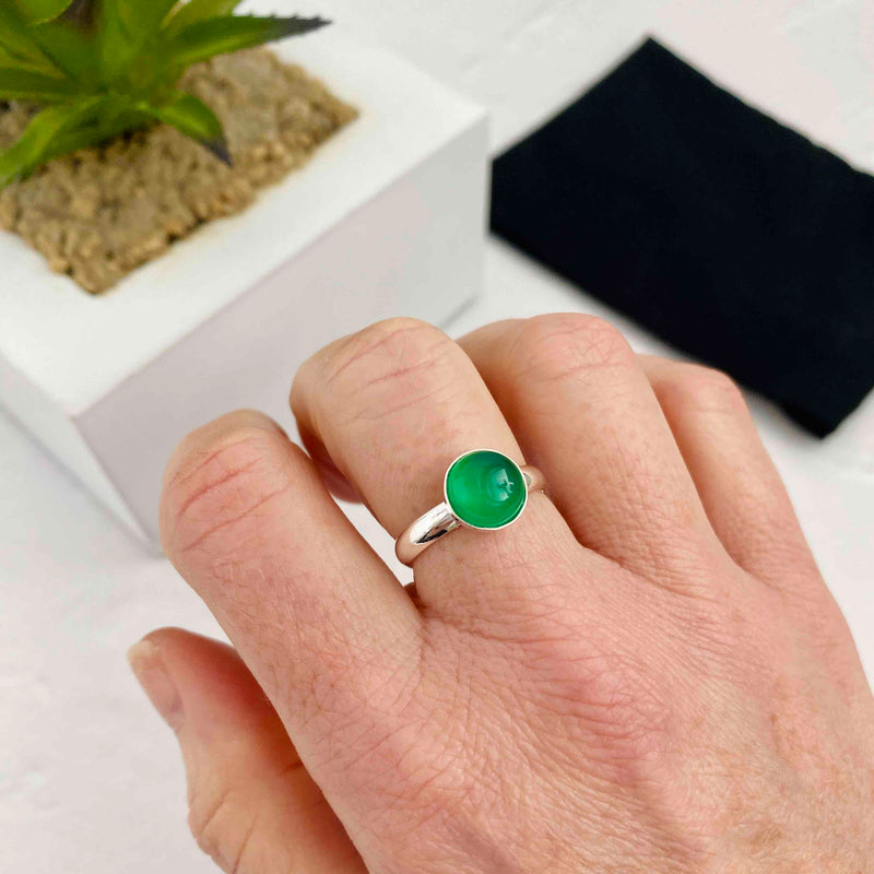 Green stone ring with adjustable silver band. KookyTwo.