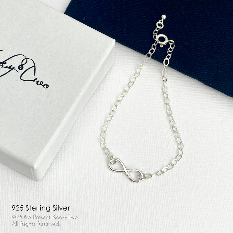 Sterling silver bracelet with silver infinity charm on sterling silver chain bracelet. KookyTwo.