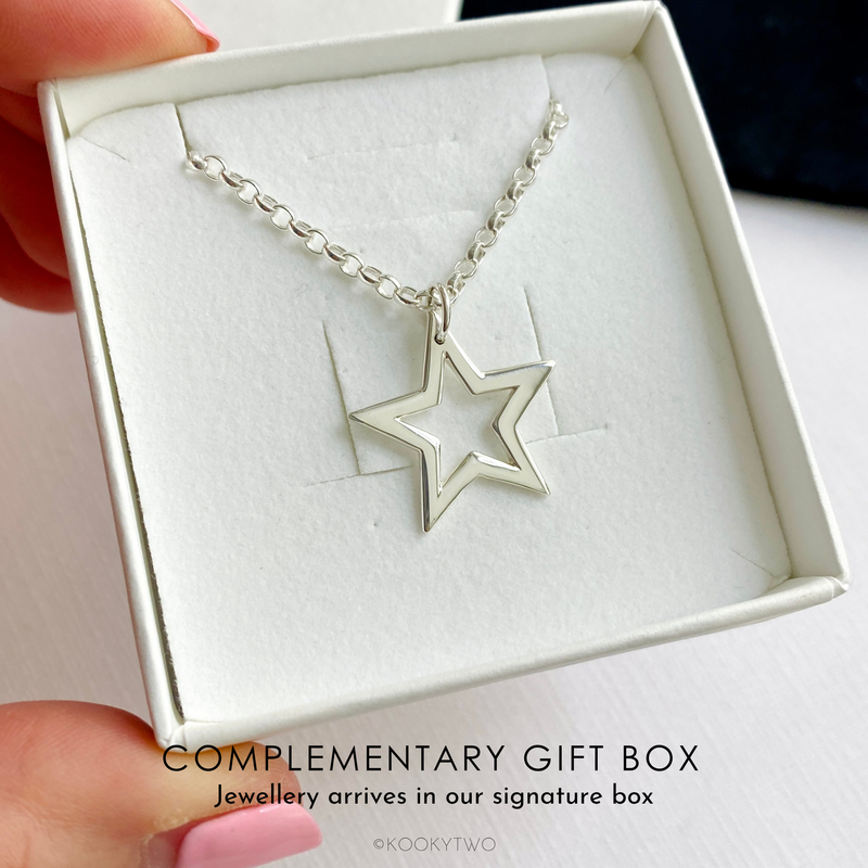 Large star pendant on chunky style chain in sterling silver. Necklace in white gift box ready for gifting.