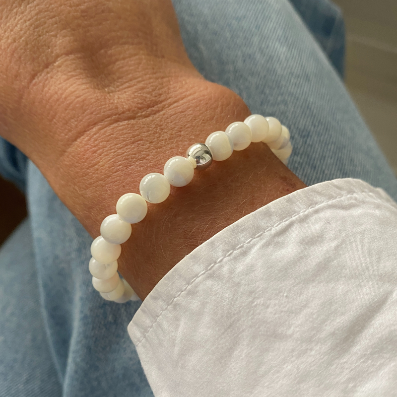 Gift-ready and gorgeous! A mother of pearl bracelet in beautiful packaging, making a thoughtful present for a loved one.