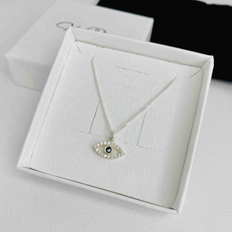 Crystal evil eye pendant on sterling silver chain, that comes in a gift box ready for gifting. Christmas necklace gift for her.