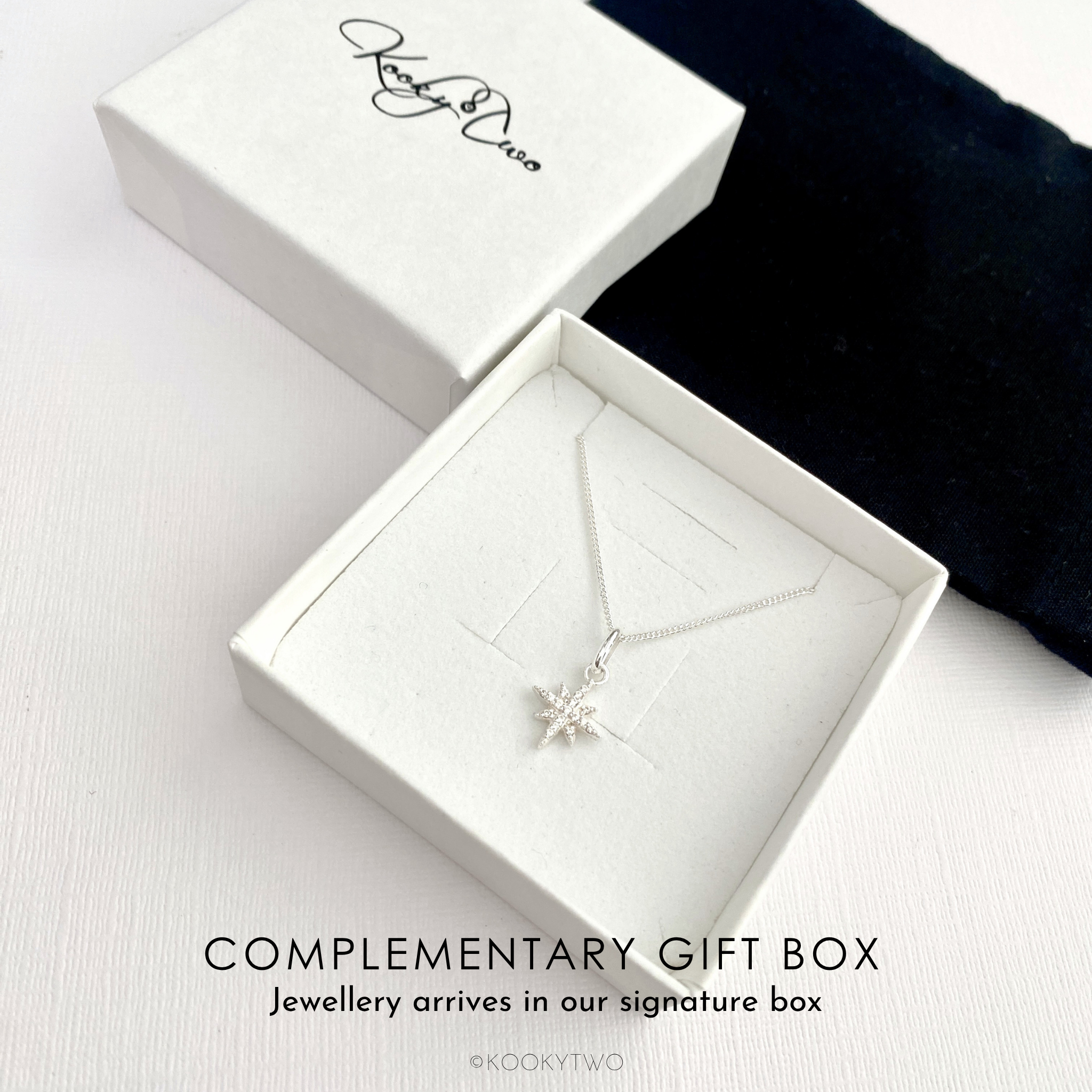 Sterling silver North Star necklace in a white gift box with 'KookyTwo' branding on a white background