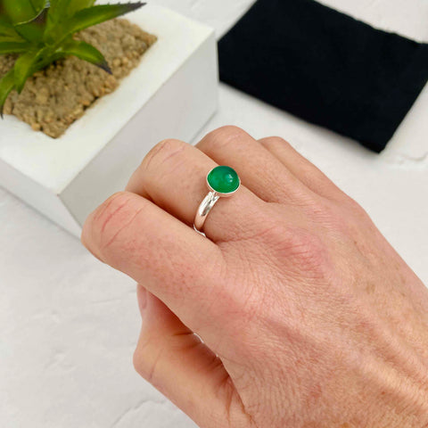 Rectangle green emerald stone with cz platinum ring -