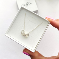 Seven Silver Rings Necklace