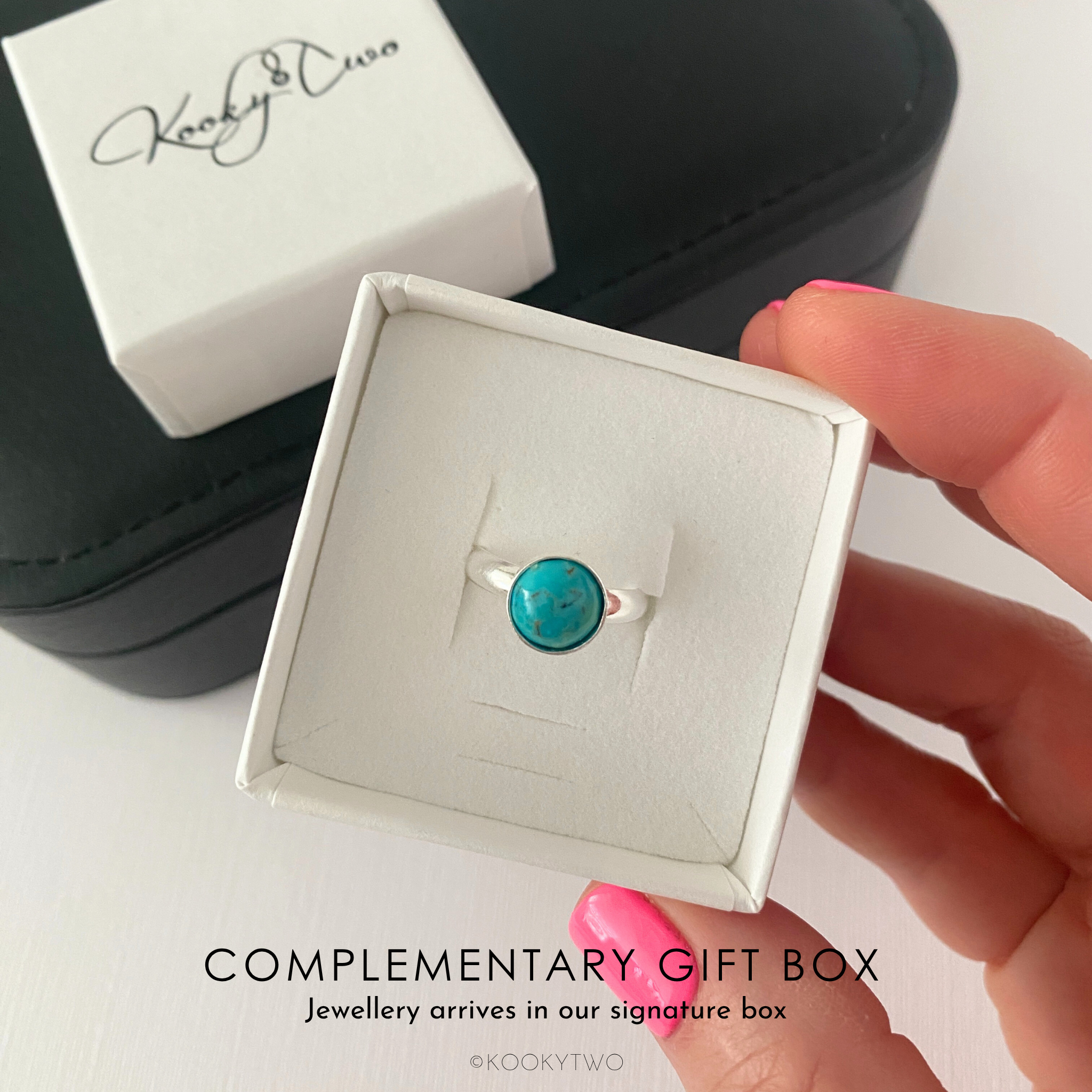 Turquoise ring in a jewellery box with 'KookyTwo' branding