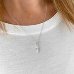 Silver cross charm necklace. KookyTwo.