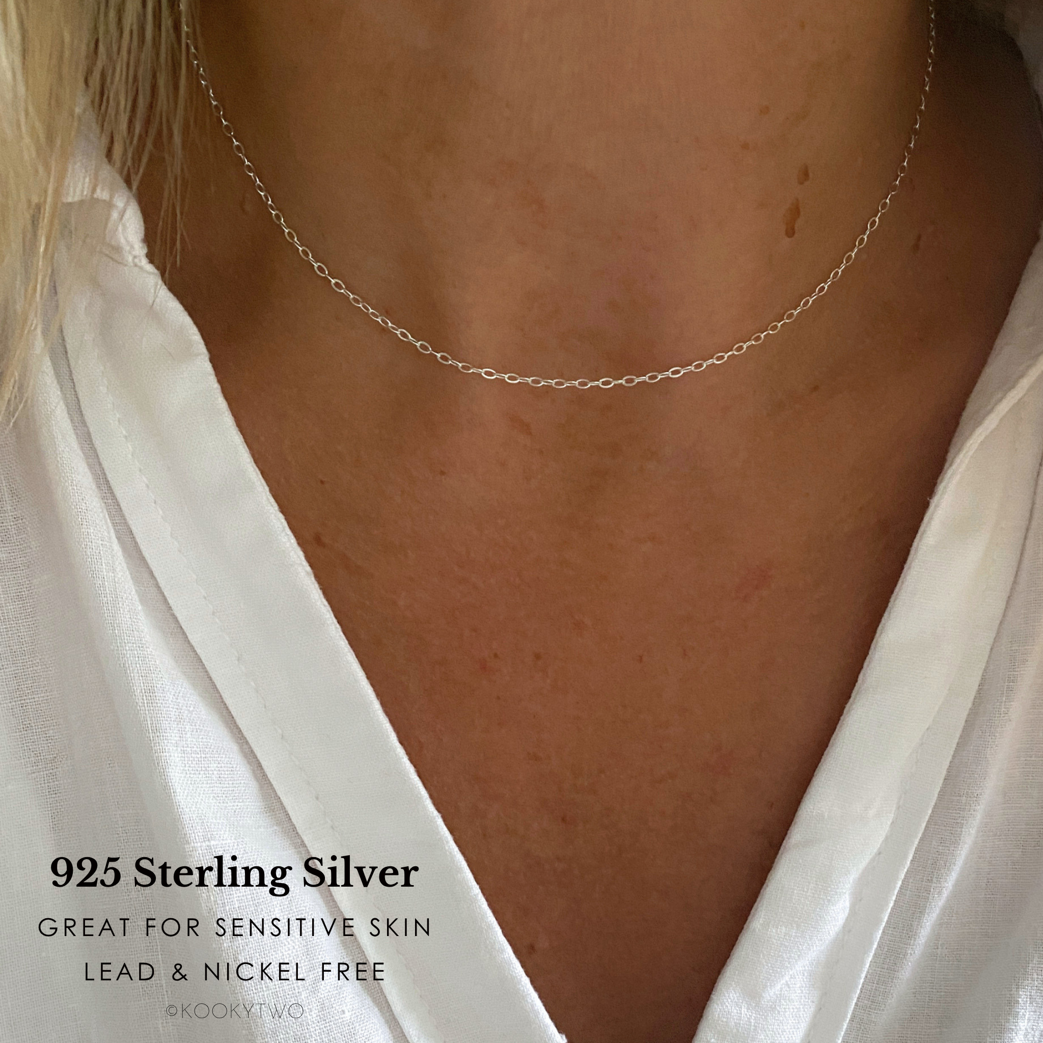 Lady wearing fine silver necklace in 925 sterling silver with white shirt. Words say great for sensitive skin and lead and nickel free. @kookytwo