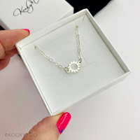 Sun charm necklace in sterling silver. KookyTwo.