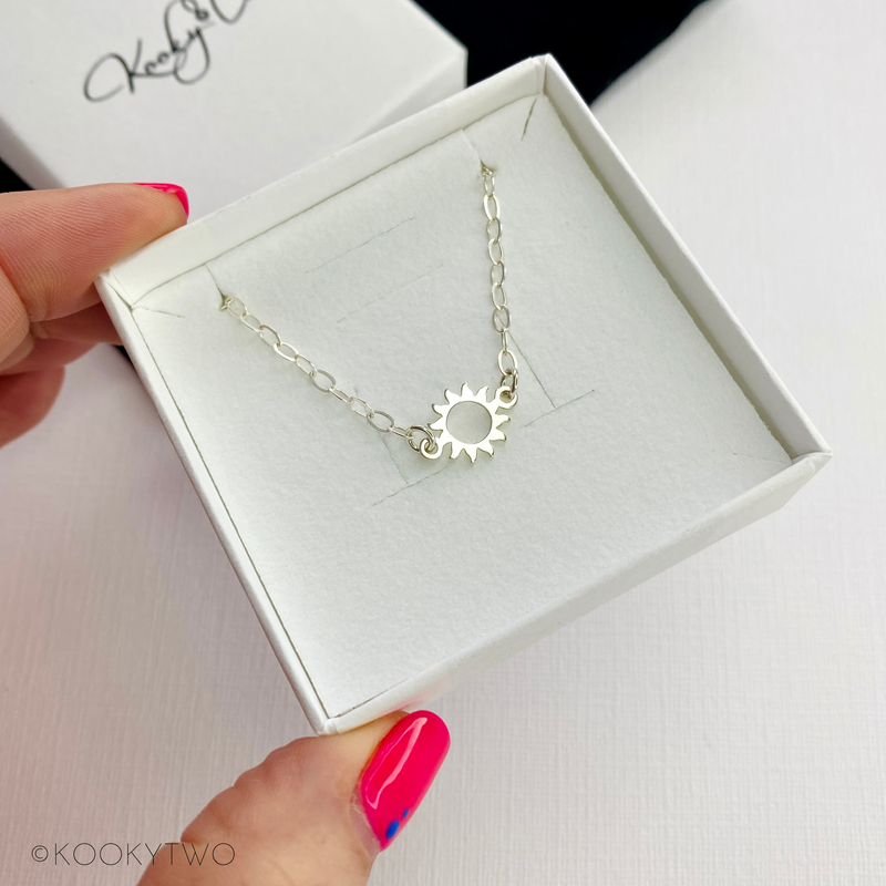 Sun charm necklace in sterling silver. KookyTwo.
