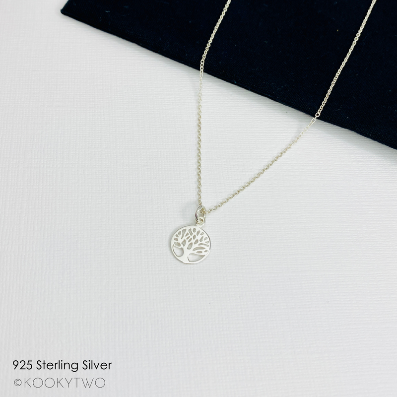 Sterling silver charm necklace with family tree charm. KookyTwo.