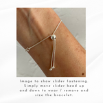 Sterling silver adjustable chain bracelet with wave charm. Kookytwo.