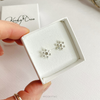 Silver snowflake stud earrings sparkly. KookyTwo