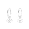 Mini hoop earrings with crystal star charm in sterling silver.