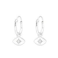 Mini hoop earrings with crystal star charm in sterling silver.