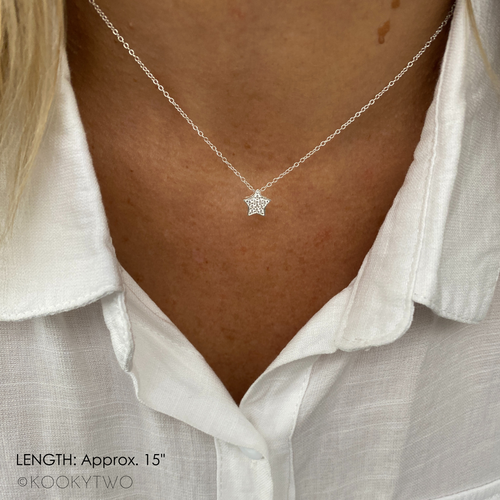 Sparkly star necklace with sterling silver star charm on Serling silver chain. KookyTwo.