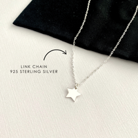 Sterling silver star necklace on a black and white background with text indicating 'Link Chain 925 Sterling Silver'.